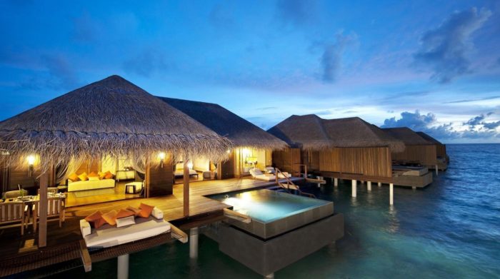 Maldives ayada honeymoon resorts luxury sagarika zaheer top resort ghatge khan kicking splash ocean indian weddingsutra